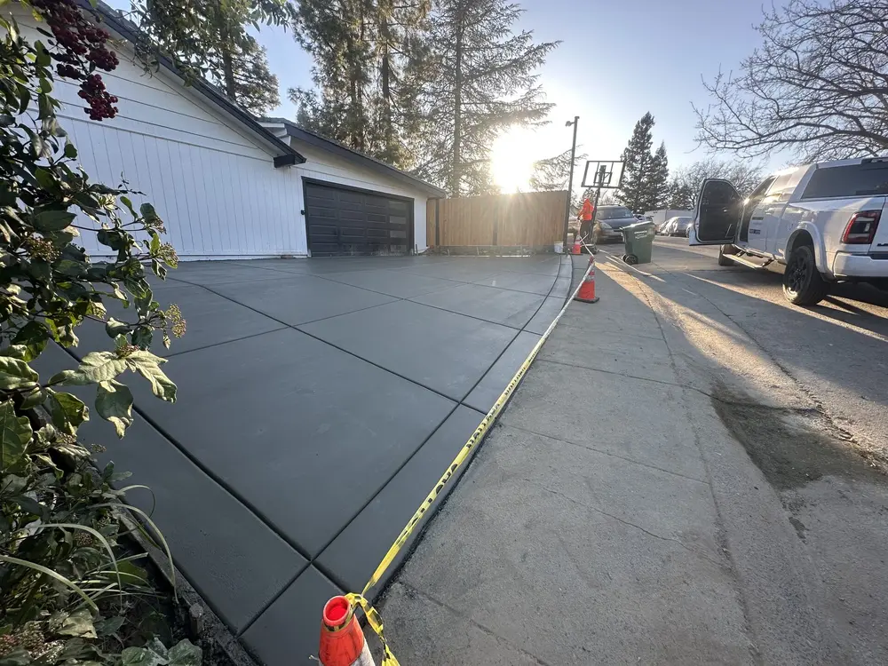 Dark charcoal finish concrete driveway